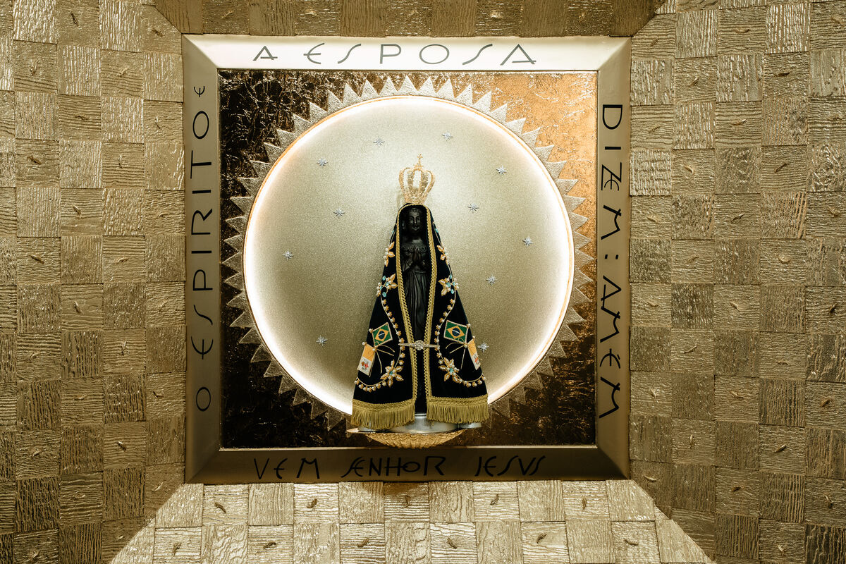 Aparecida shrine niche in a gilded mosaic frame