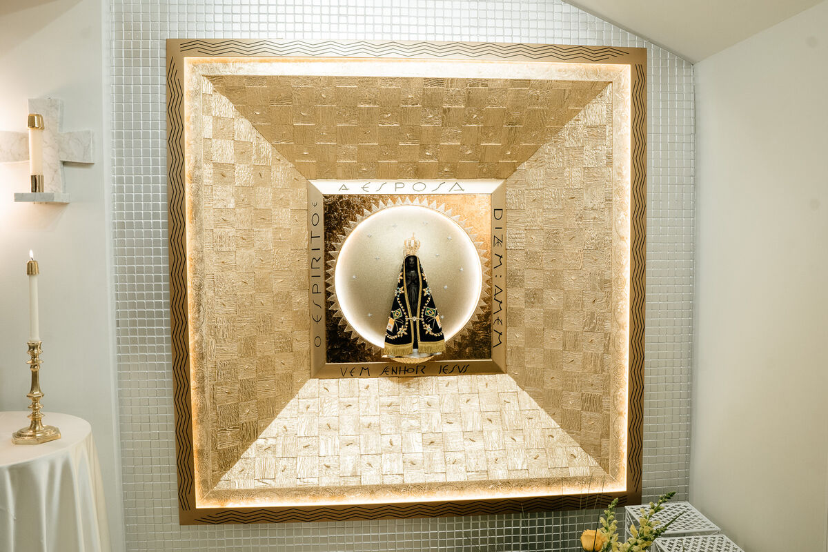 Shrine niche of Our Lady of Aparecida with gold mosaic