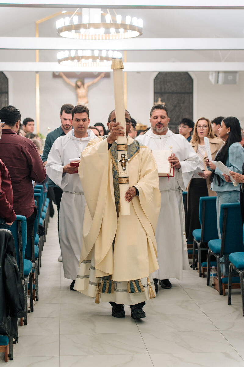 The Paschal candle carried in procession at the Easter Vigil
